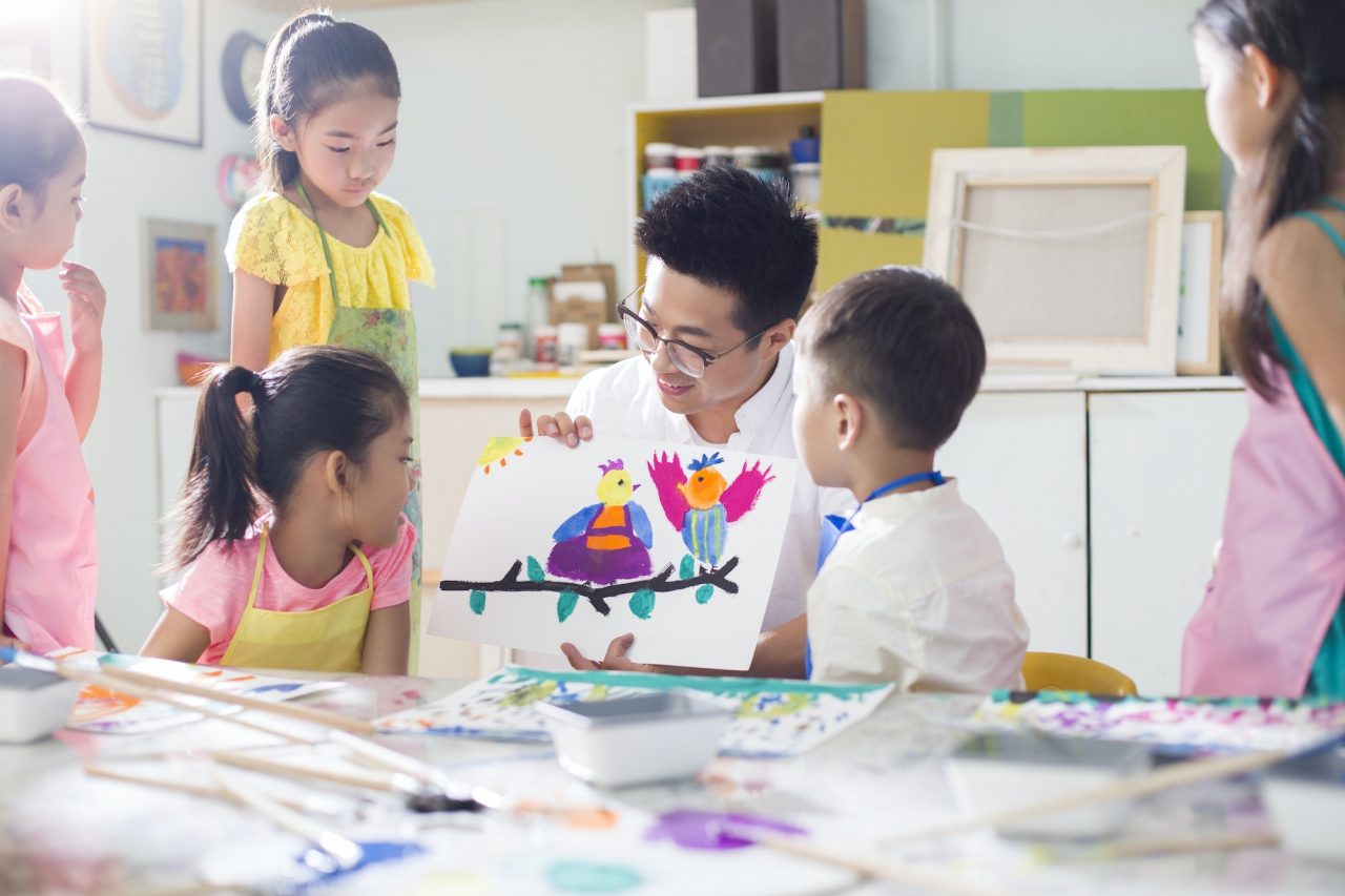 Little children in art class with teacher.jpg